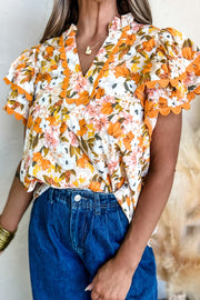 Ruffled Notched Short Sleeve Floral Blouse.