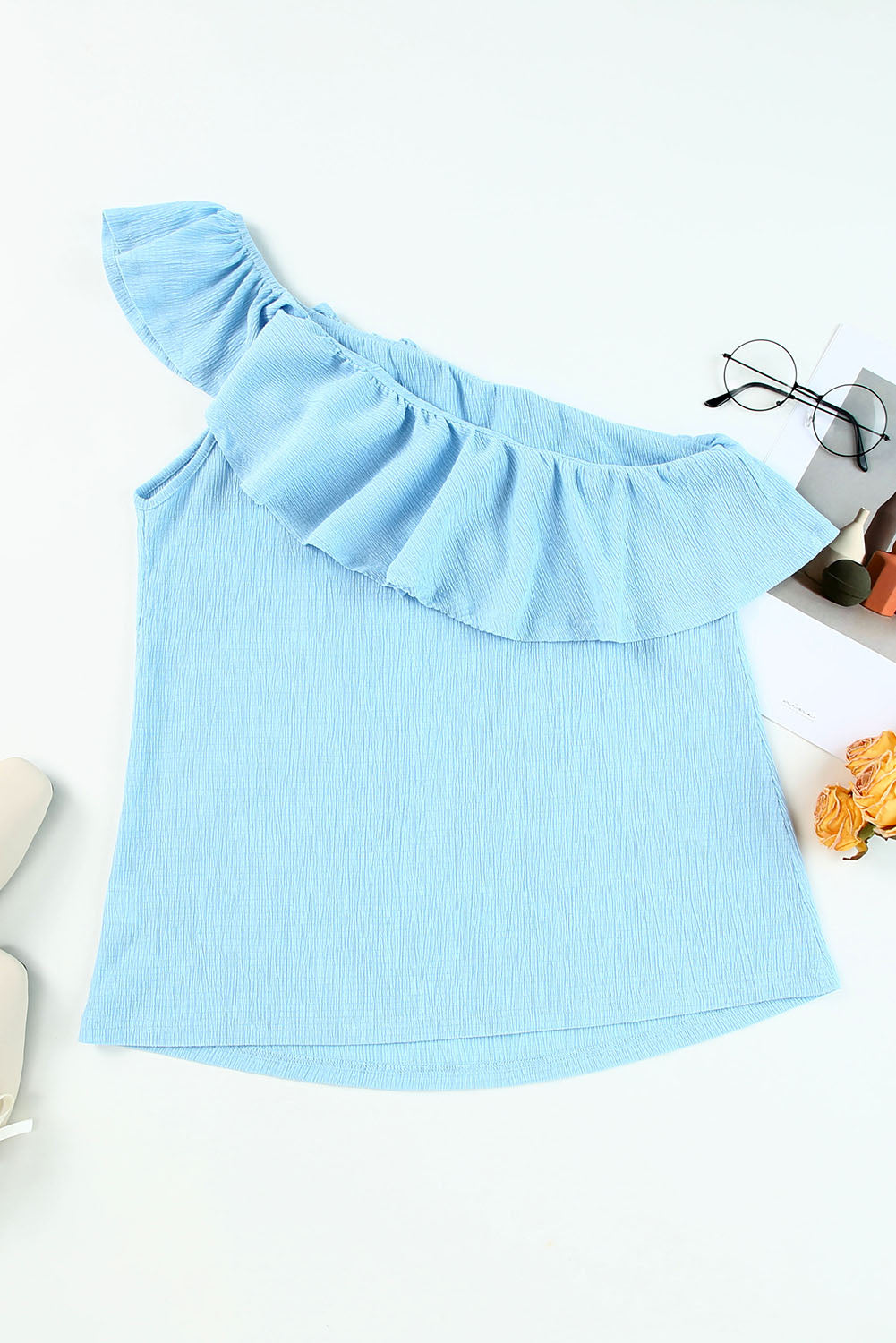 Ruffled one-shoulder tank top.