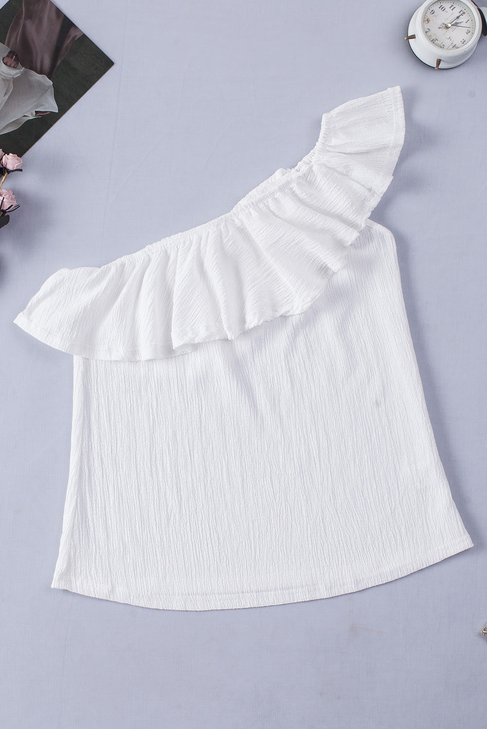 Ruffled one-shoulder tank top.
