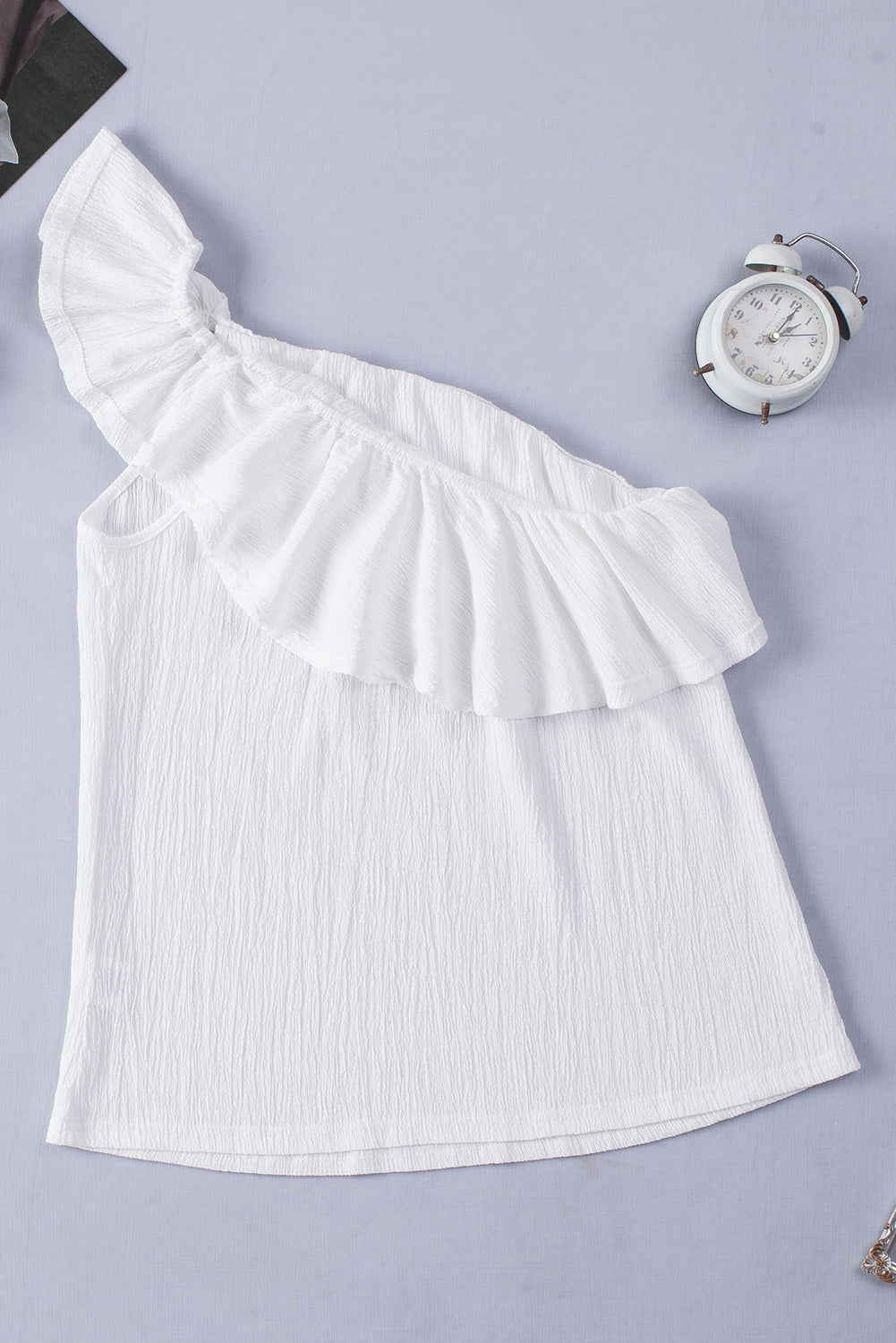Ruffled one-shoulder tank top.