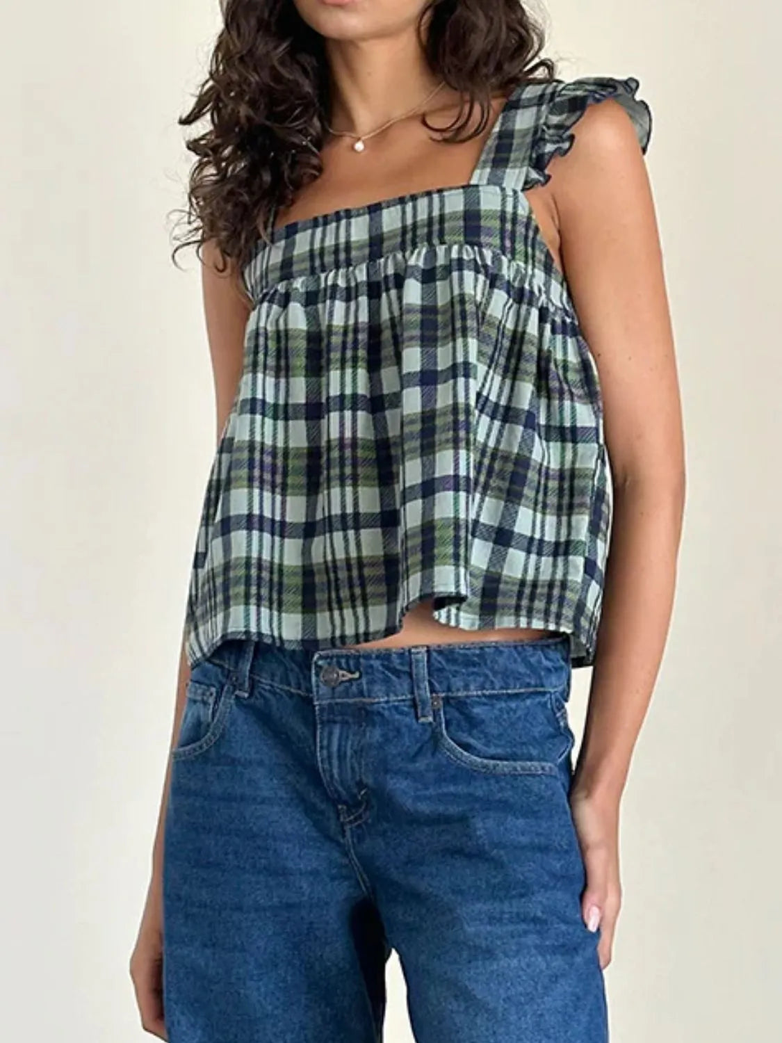 Ruffled plaid square neck tank top.