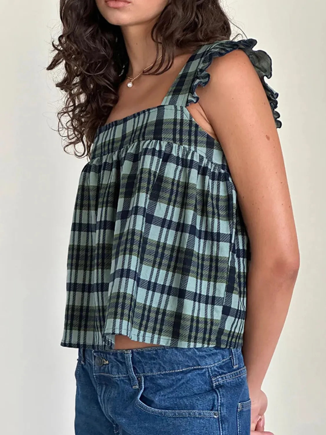 Ruffled plaid square neck tank top.