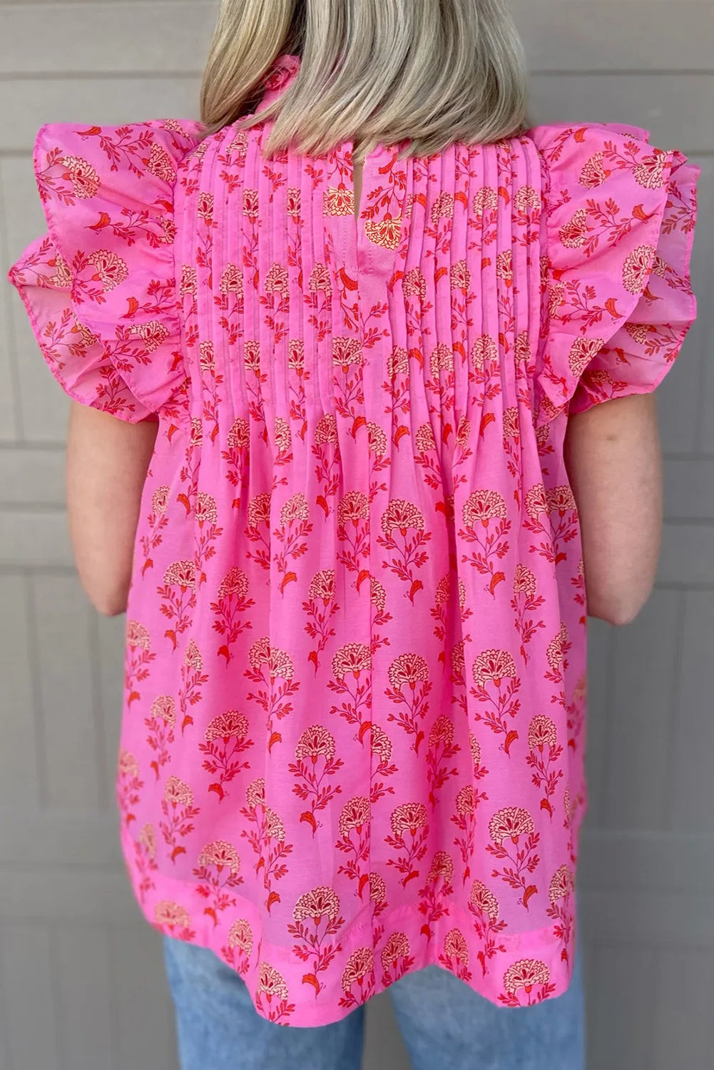 Ruffled Printed Mock Neck Cap Sleeve Blouse.