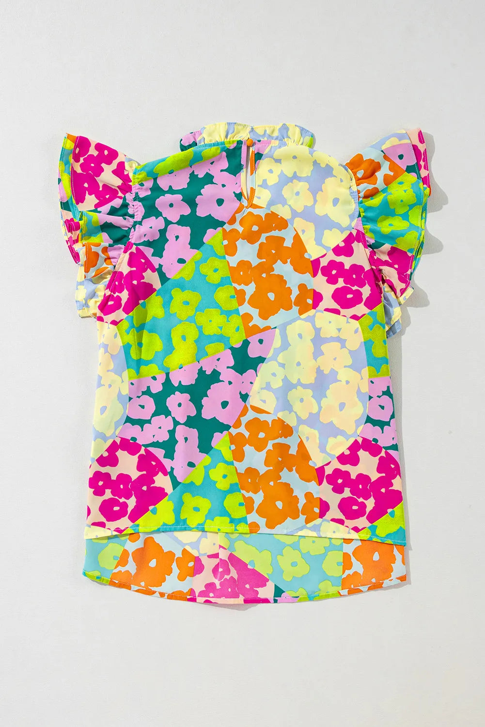 Ruffled Printed Mock Neck Cap Sleeve Blouse.