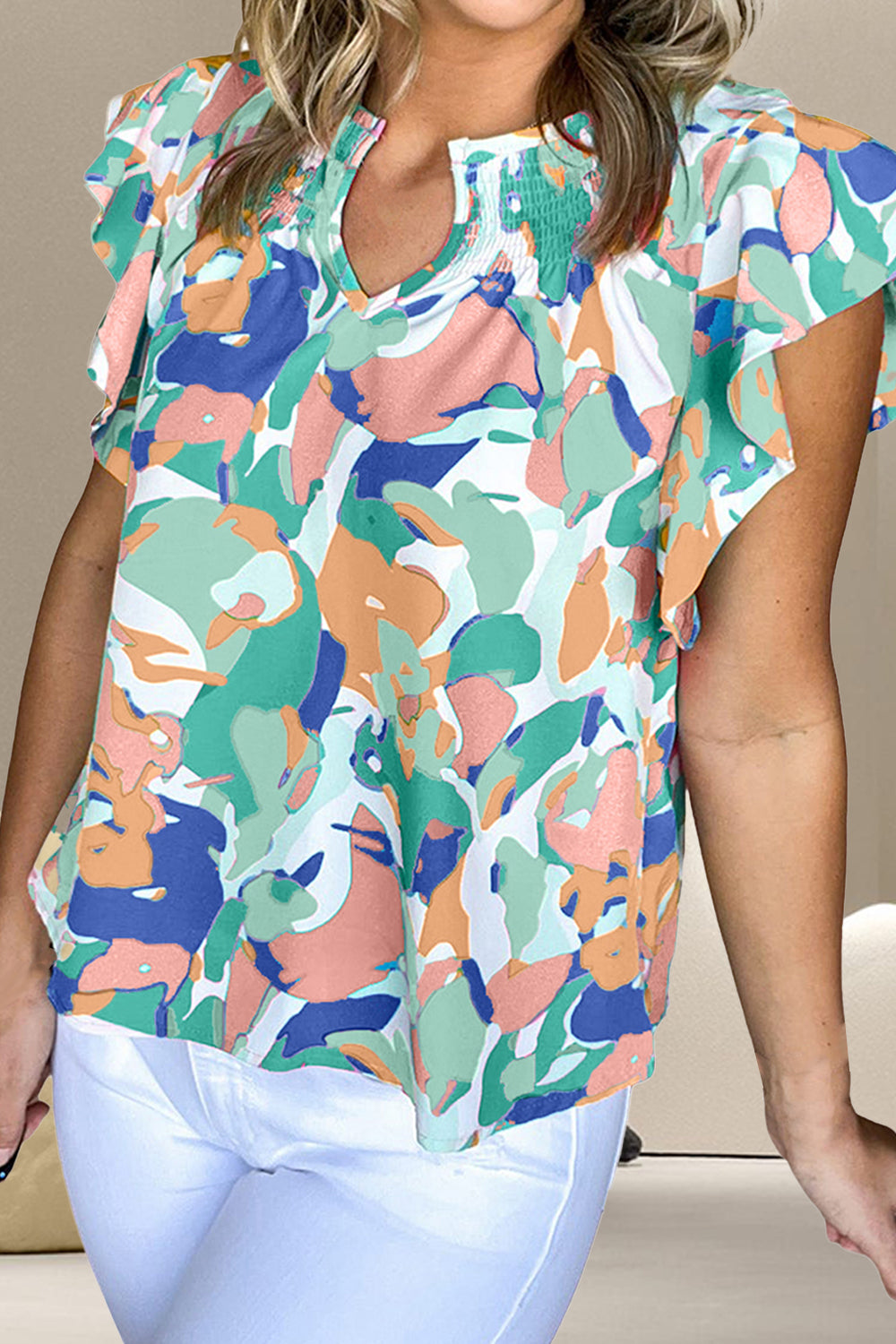 Ruffled Printed Notched Cap Sleeve Blouse.