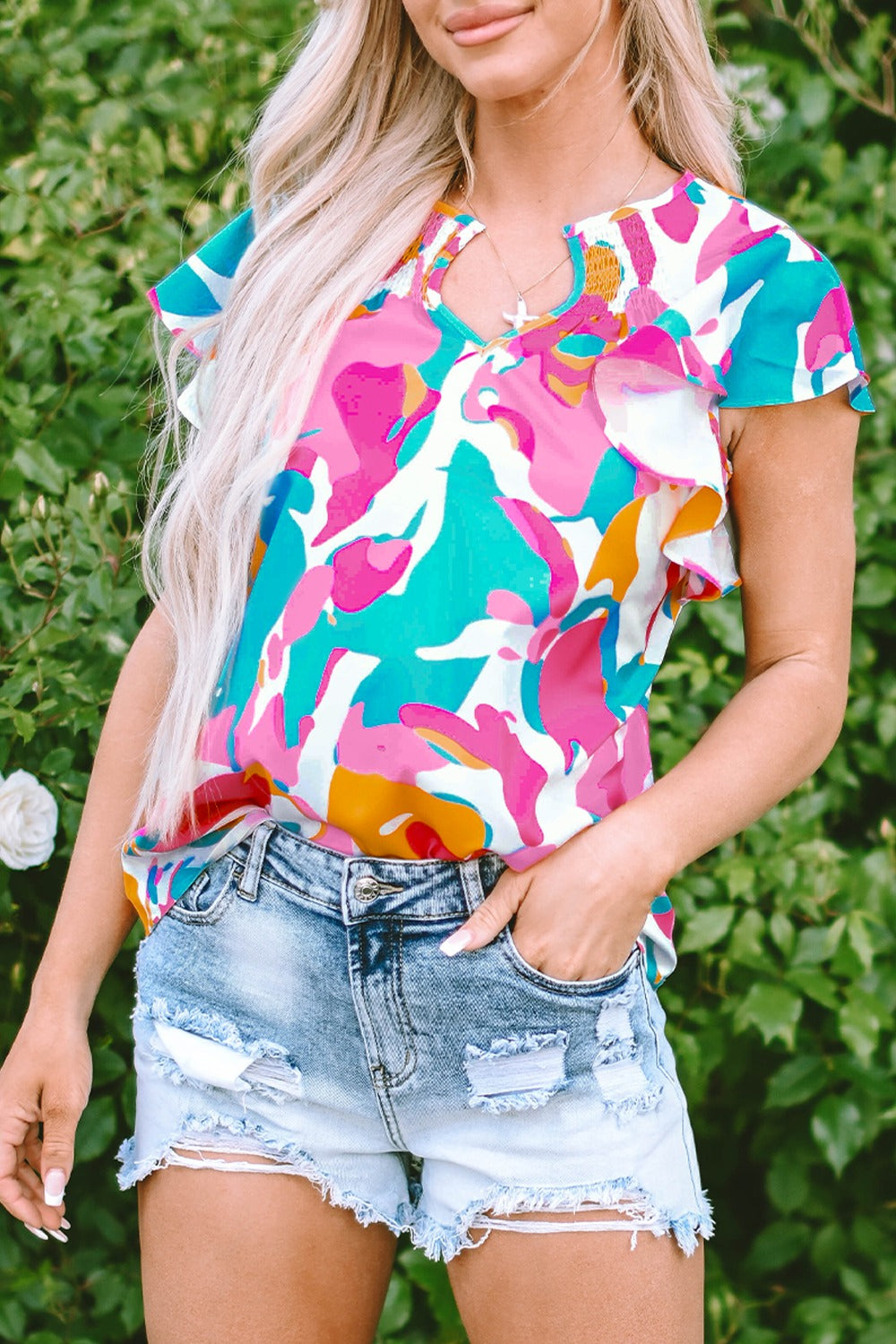 Ruffled Printed Notched Cap Sleeve Blouse.