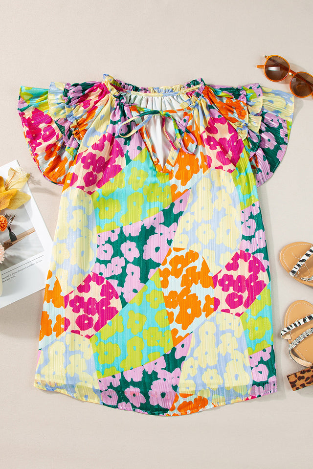 Ruffled Printed Tie Neck Cap Sleeve Blouse with Tied.