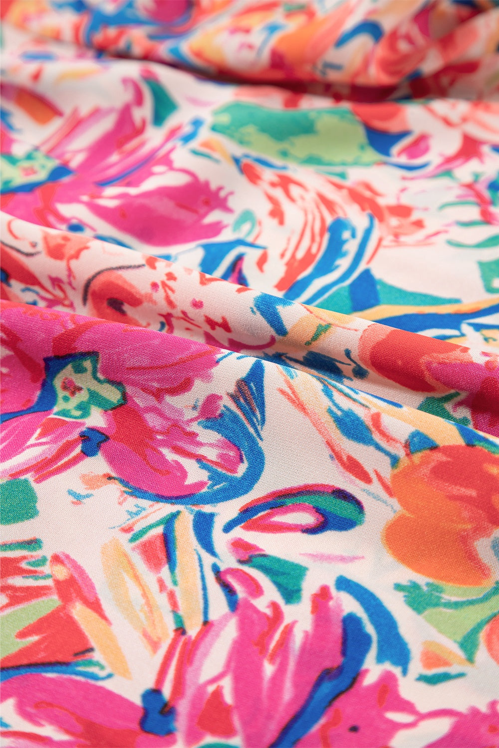 Ruffled Printed Tie Neck Cap Sleeve Blouse with Tied.