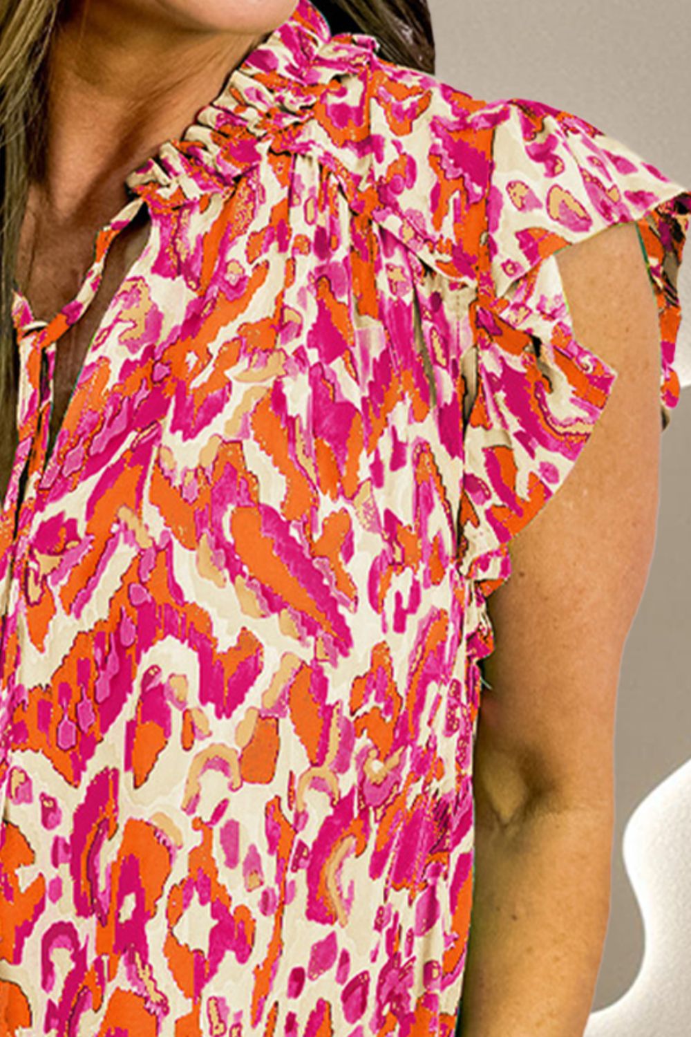 Ruffled Printed Tie Neck Cap Sleeve Blouse with Tied.