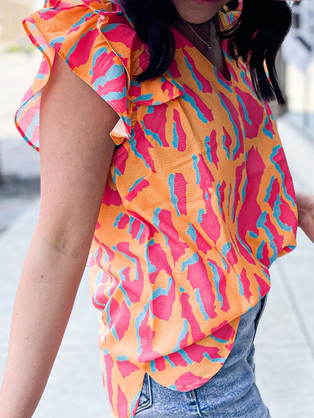Ruffled Printed V-Neck Cap Sleeve Blouse.