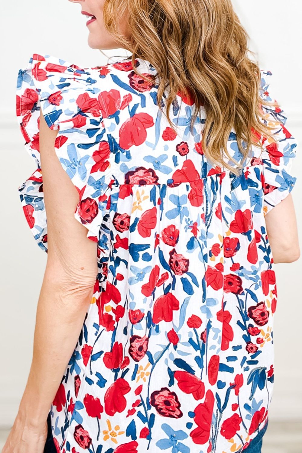 Ruffled Printed V-Neck Cap Sleeve Blouse.