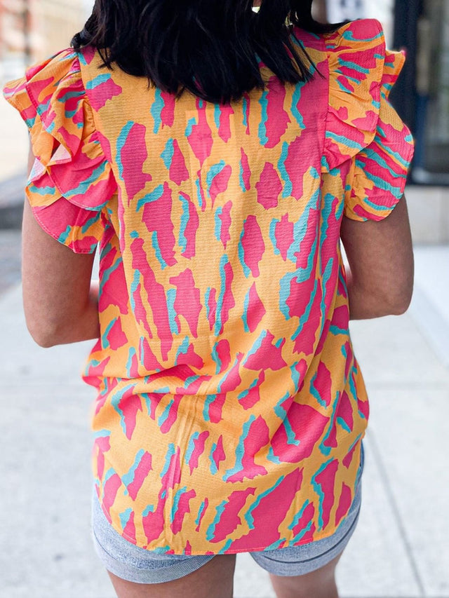 Ruffled Printed V-Neck Cap Sleeve Blouse.