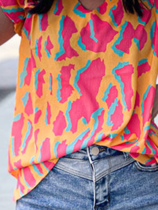 Ruffled Printed V-Neck Cap Sleeve Blouse.