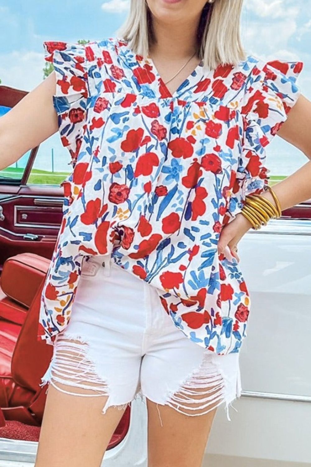 Ruffled Printed V-Neck Cap Sleeve Blouse.