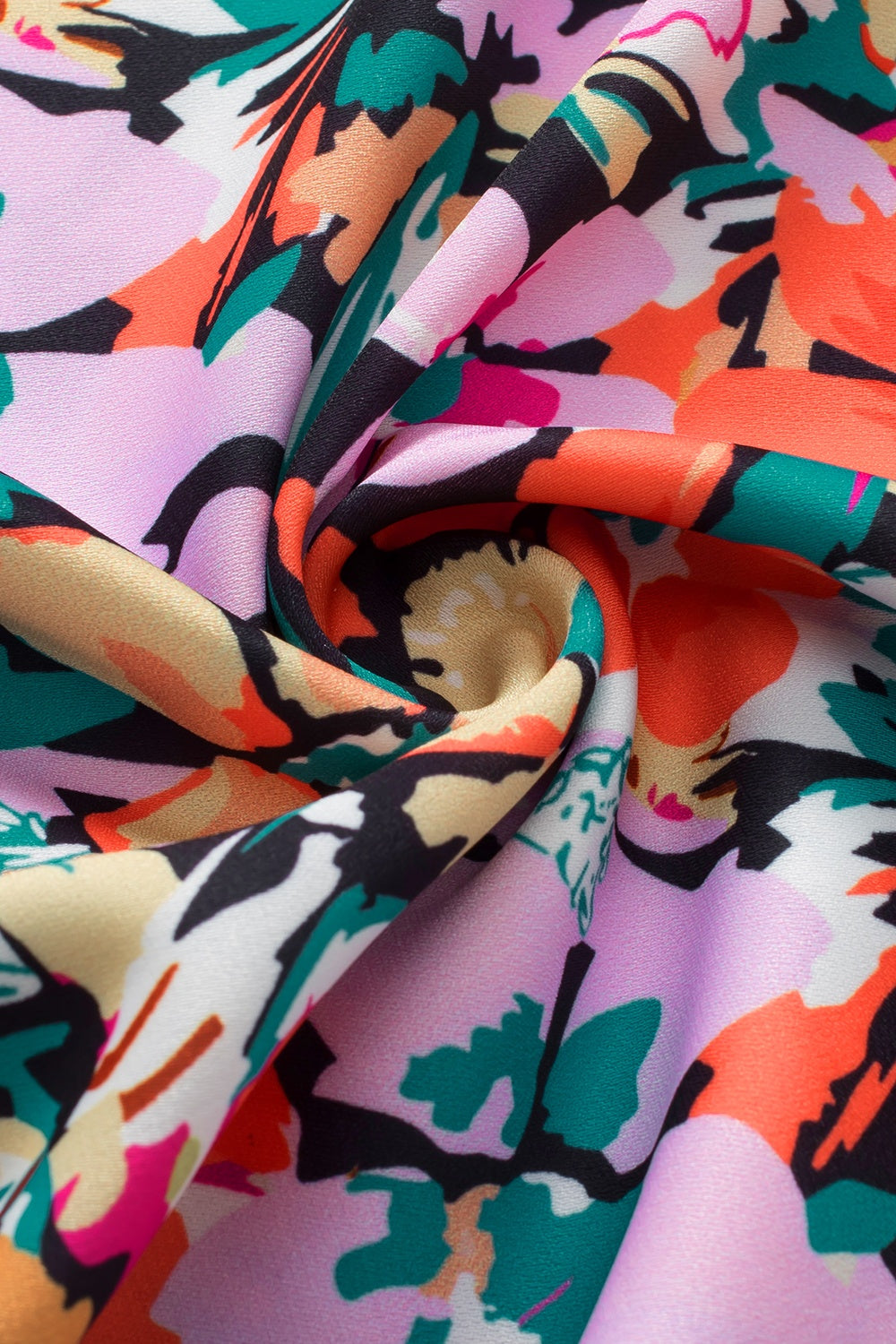 Ruffled Printed V-Neck Cap Sleeve Blouse.