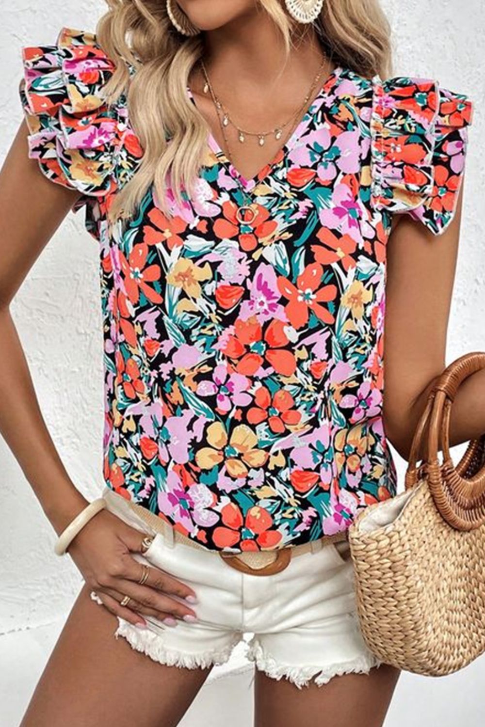 Ruffled Printed V-Neck Cap Sleeve Blouse.