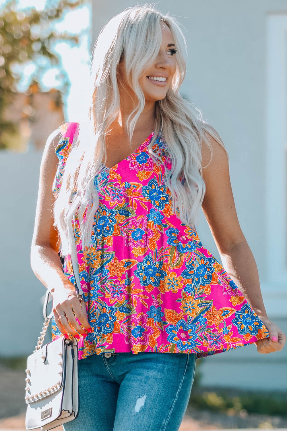 Ruffled printed V-neck tank top.