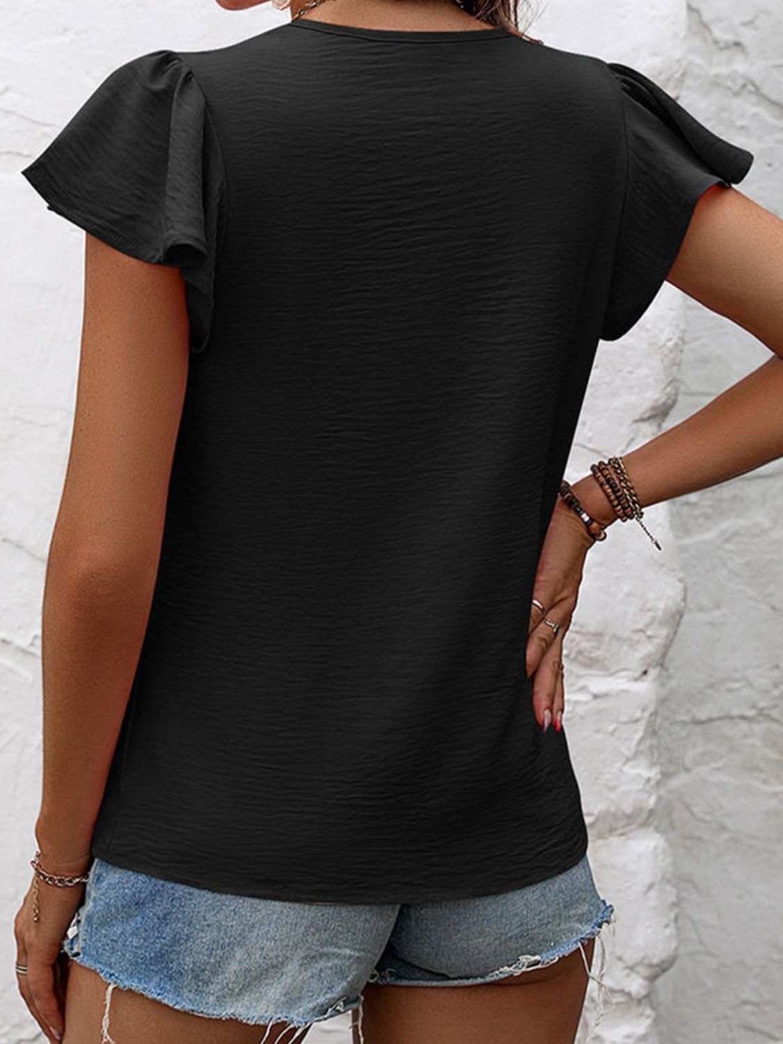 Ruffled Round Neck Cap Sleeve Blouse.