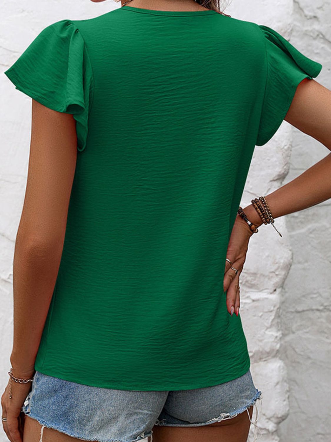 Ruffled Round Neck Cap Sleeve Blouse.