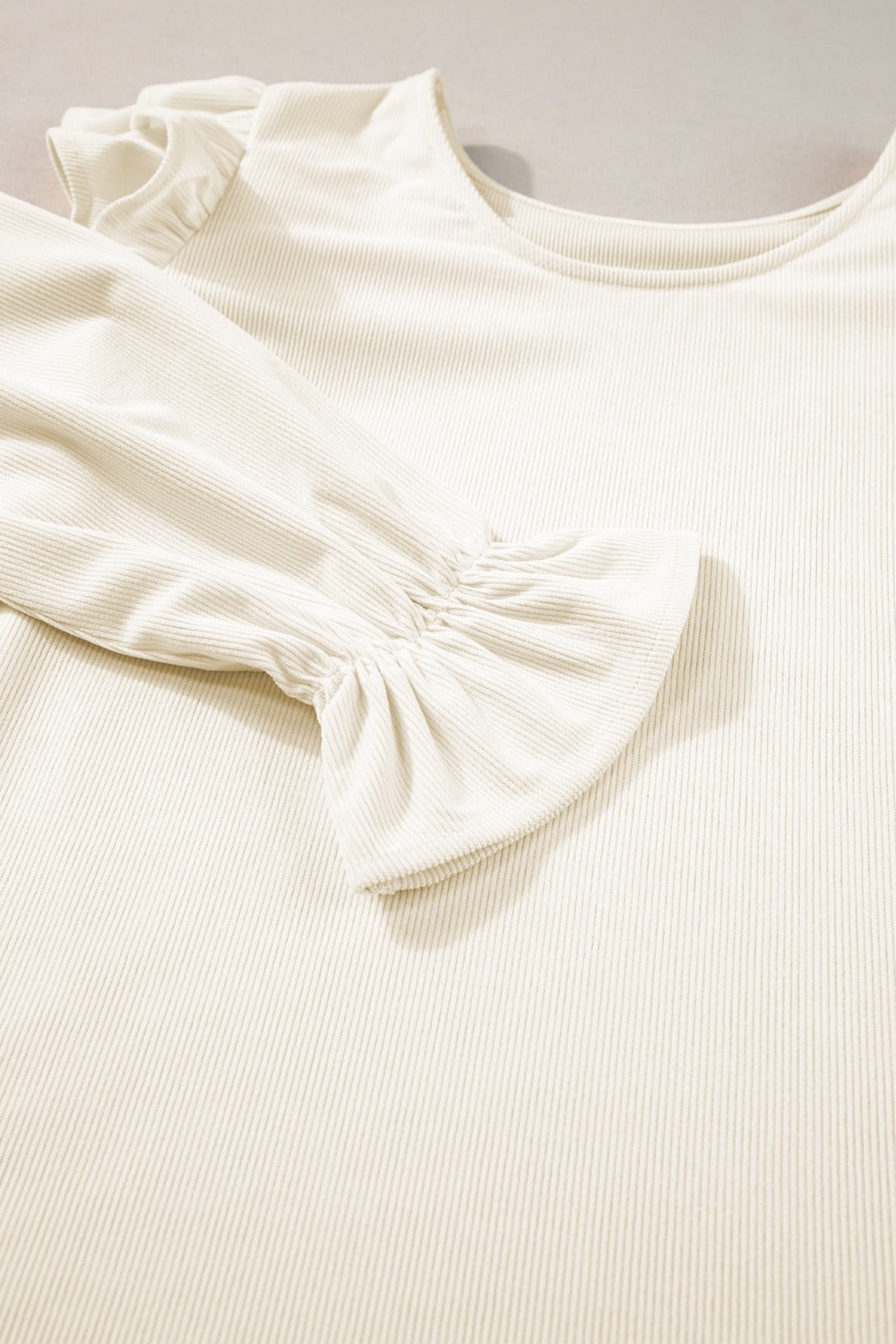 Ruffled Round Neck Flounce Sleeve Top.