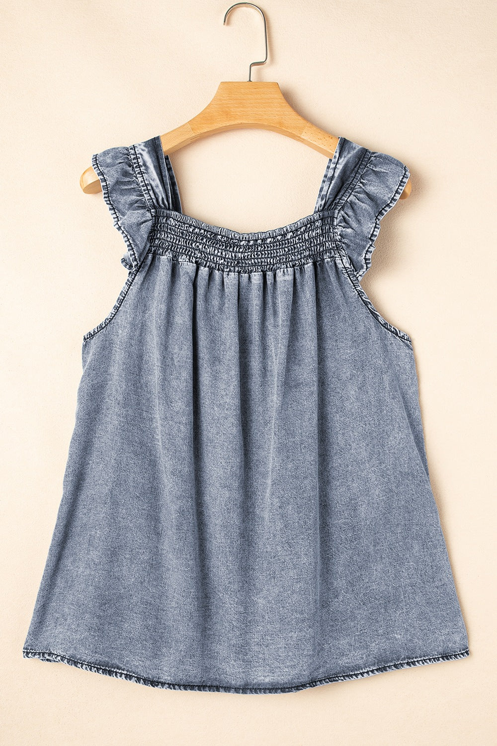 Ruffled shirred denim top.