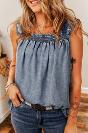 Ruffled shirred denim top.