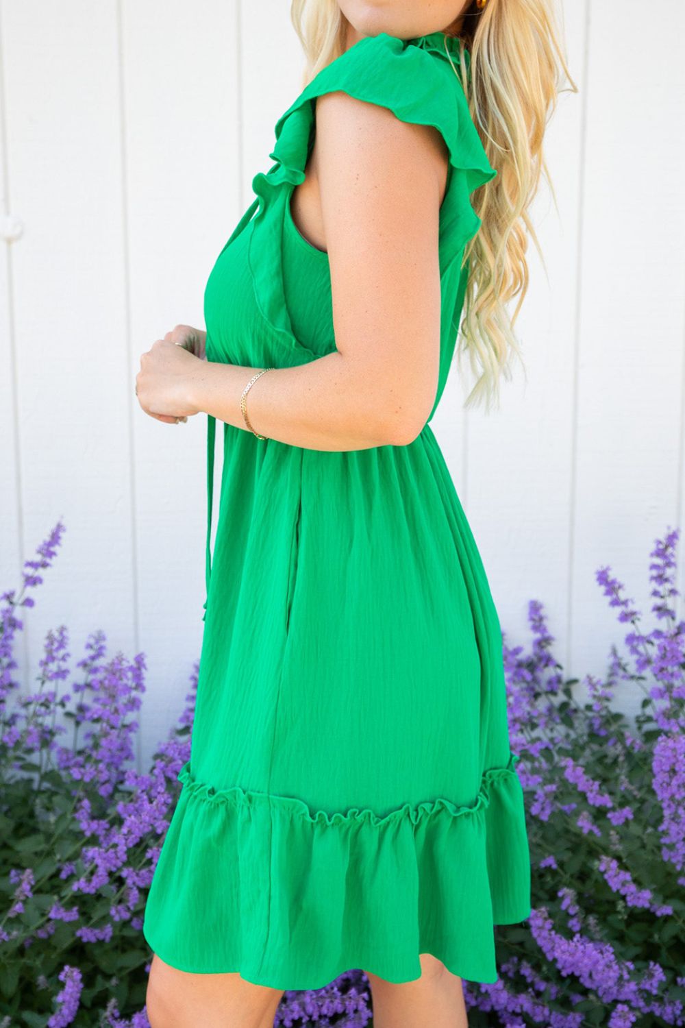 Ruffled Sleeveless Mini Dress.