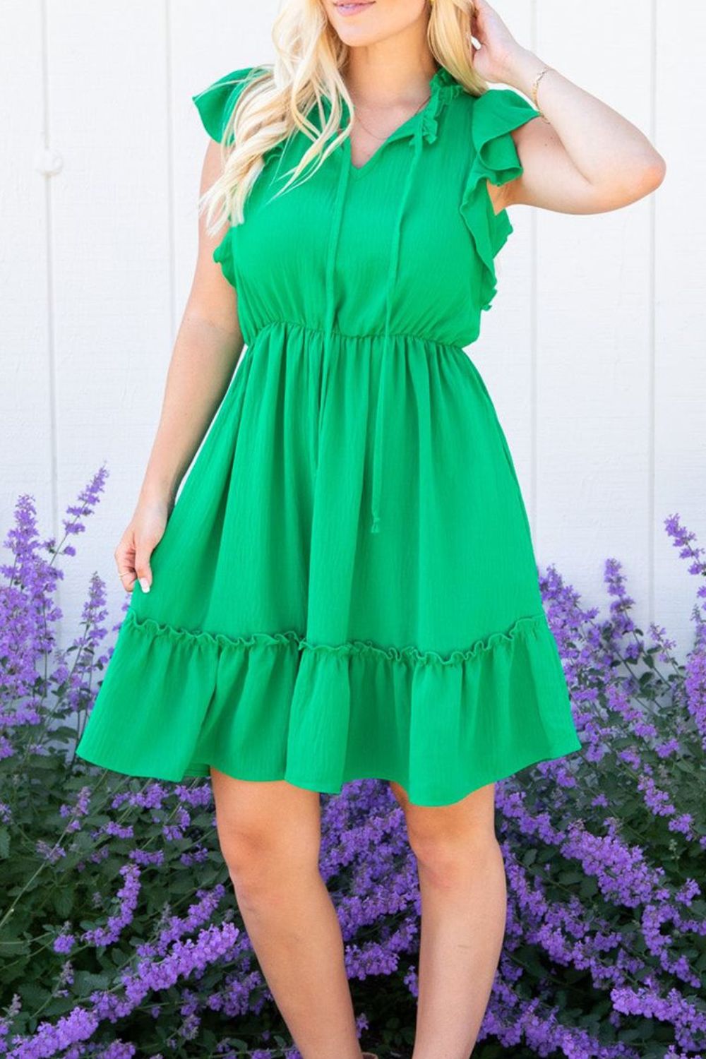 Ruffled Sleeveless Mini Dress.