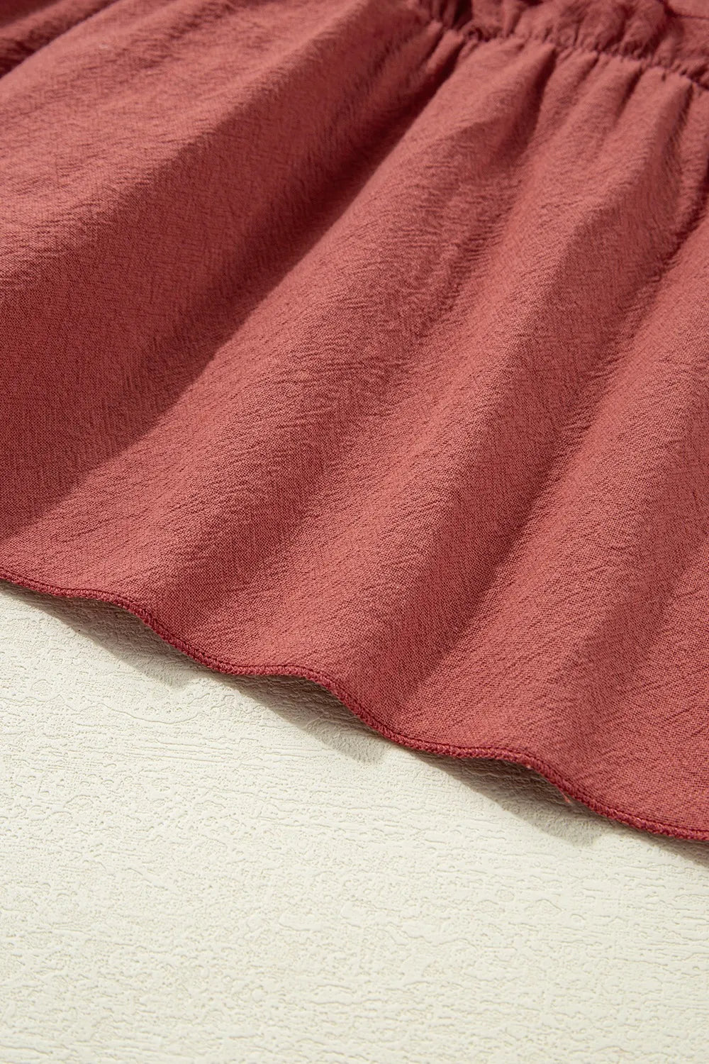 Ruffled Smocked Cap Sleeve Mini Dress.