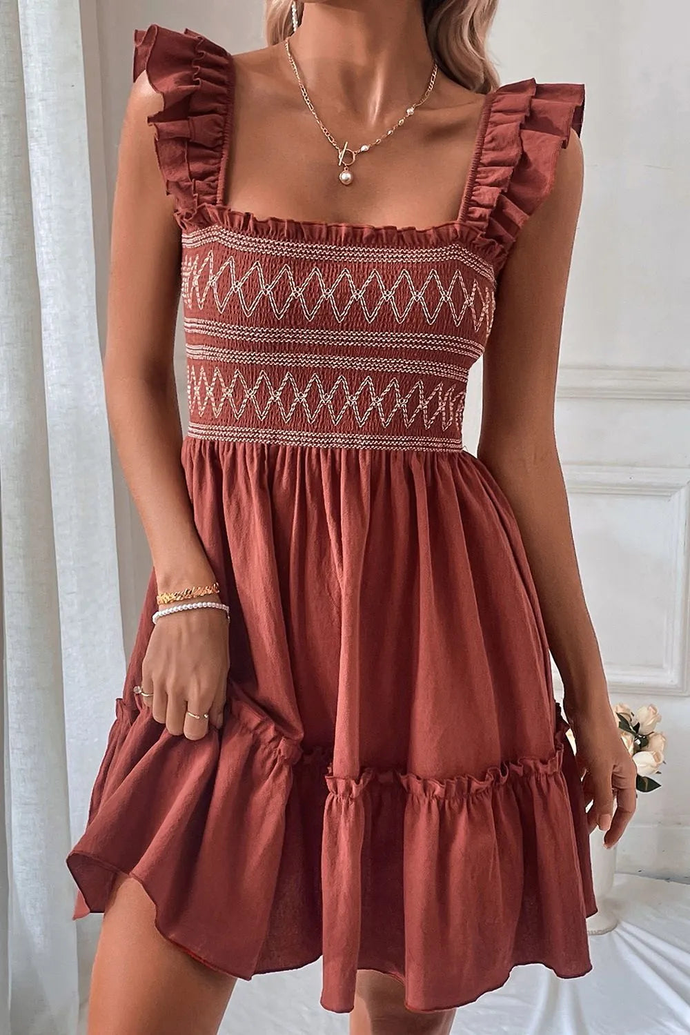 Ruffled Smocked Cap Sleeve Mini Dress.