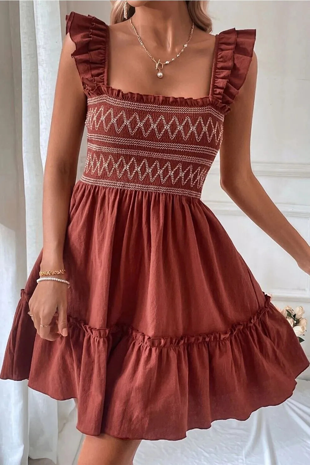 Ruffled Smocked Cap Sleeve Mini Dress.