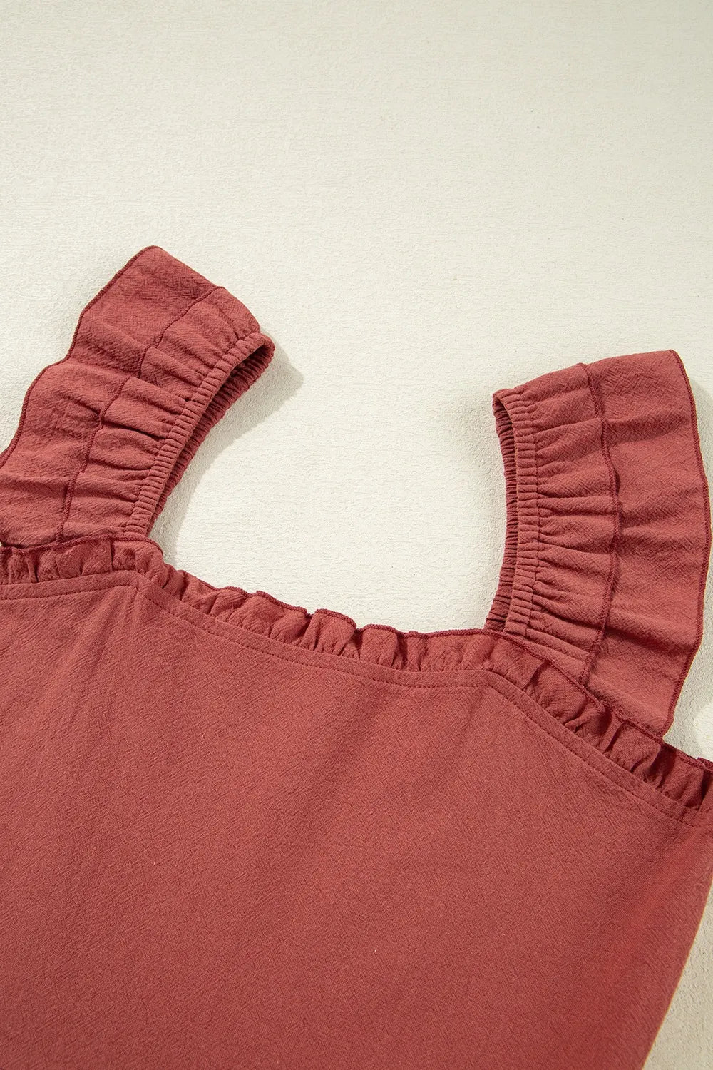 Ruffled Smocked Cap Sleeve Mini Dress.