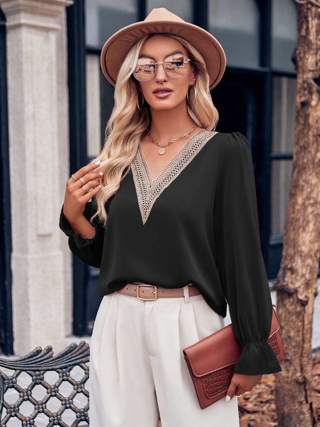 Ruffled V-Neck Flounce Sleeve Blouse with Lace Detail.
