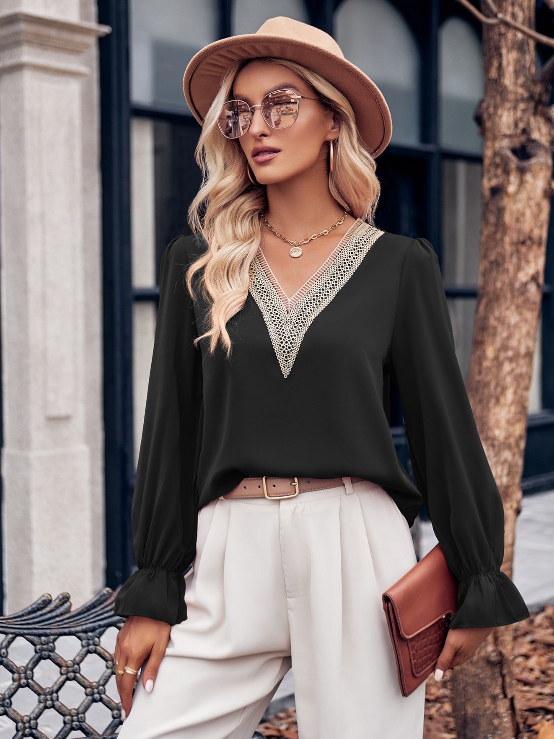 Ruffled V-Neck Flounce Sleeve Blouse with Lace Detail.