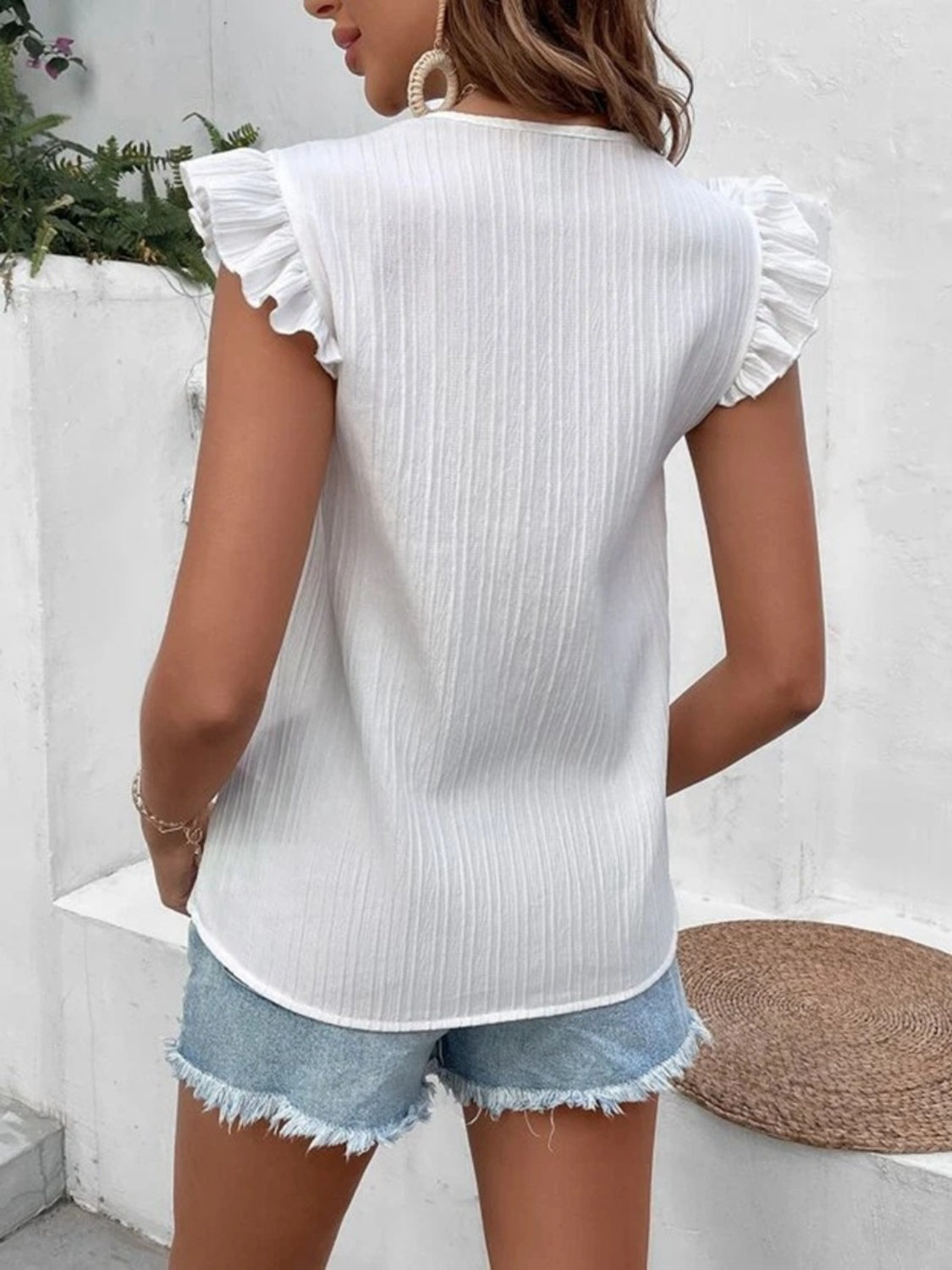 Full size ruffled V-neck tank top.