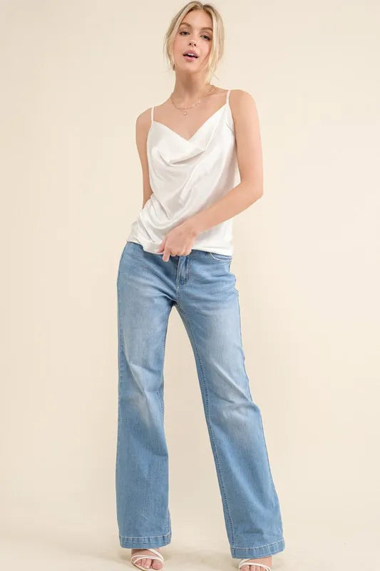 Satin cami with adjustable strap and ruched details, regular fit, slightly stretchy.