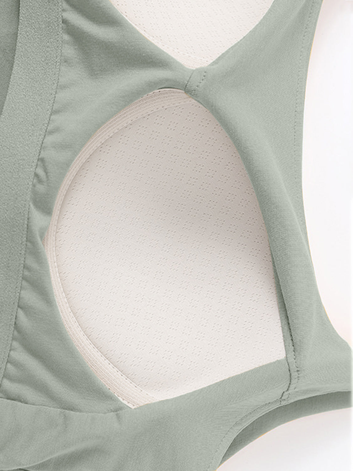Scoop neck cropped cami with chest pads, opaque and highly stretchy.