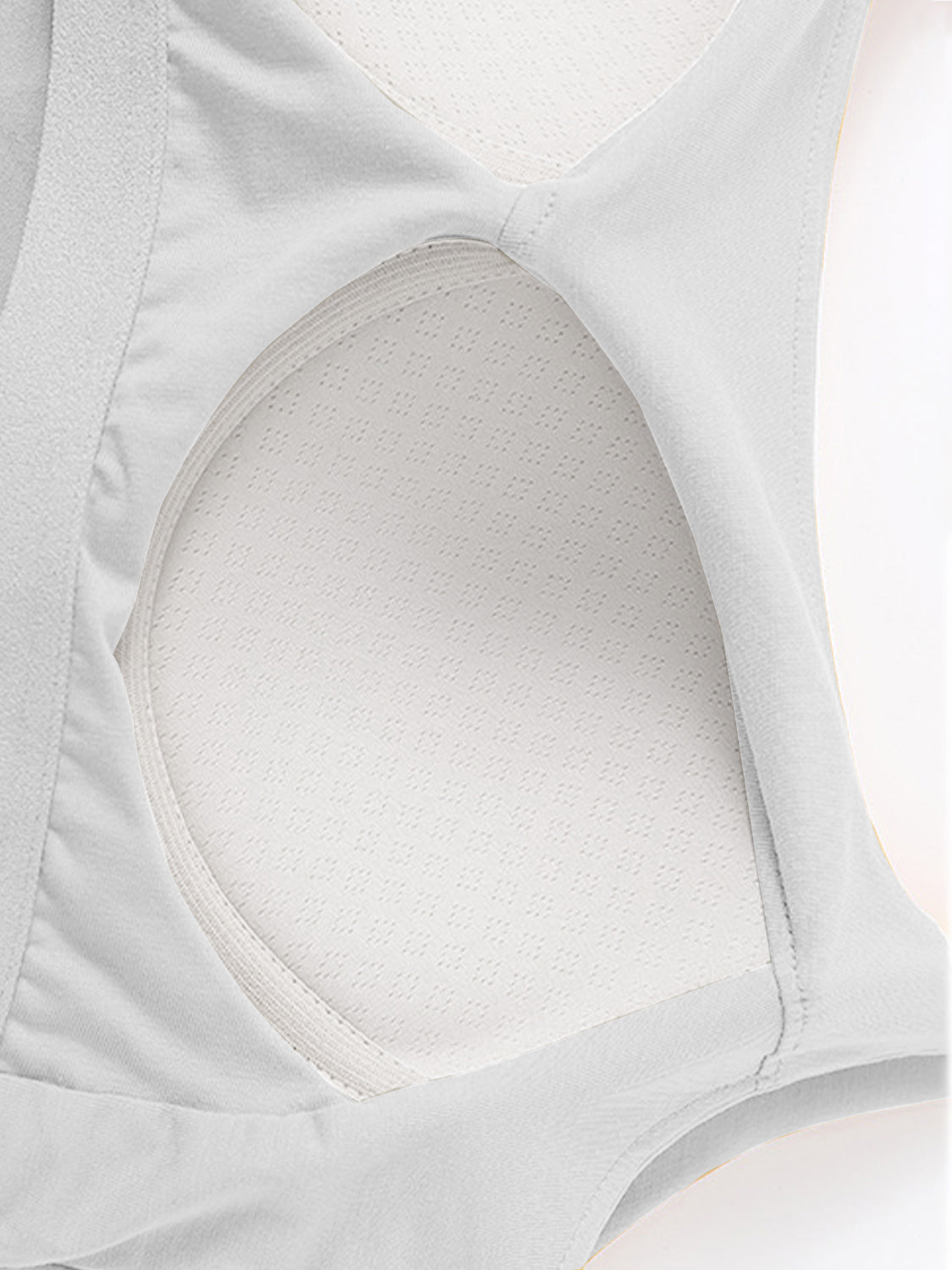 Scoop neck cropped cami with chest pads, opaque and highly stretchy.