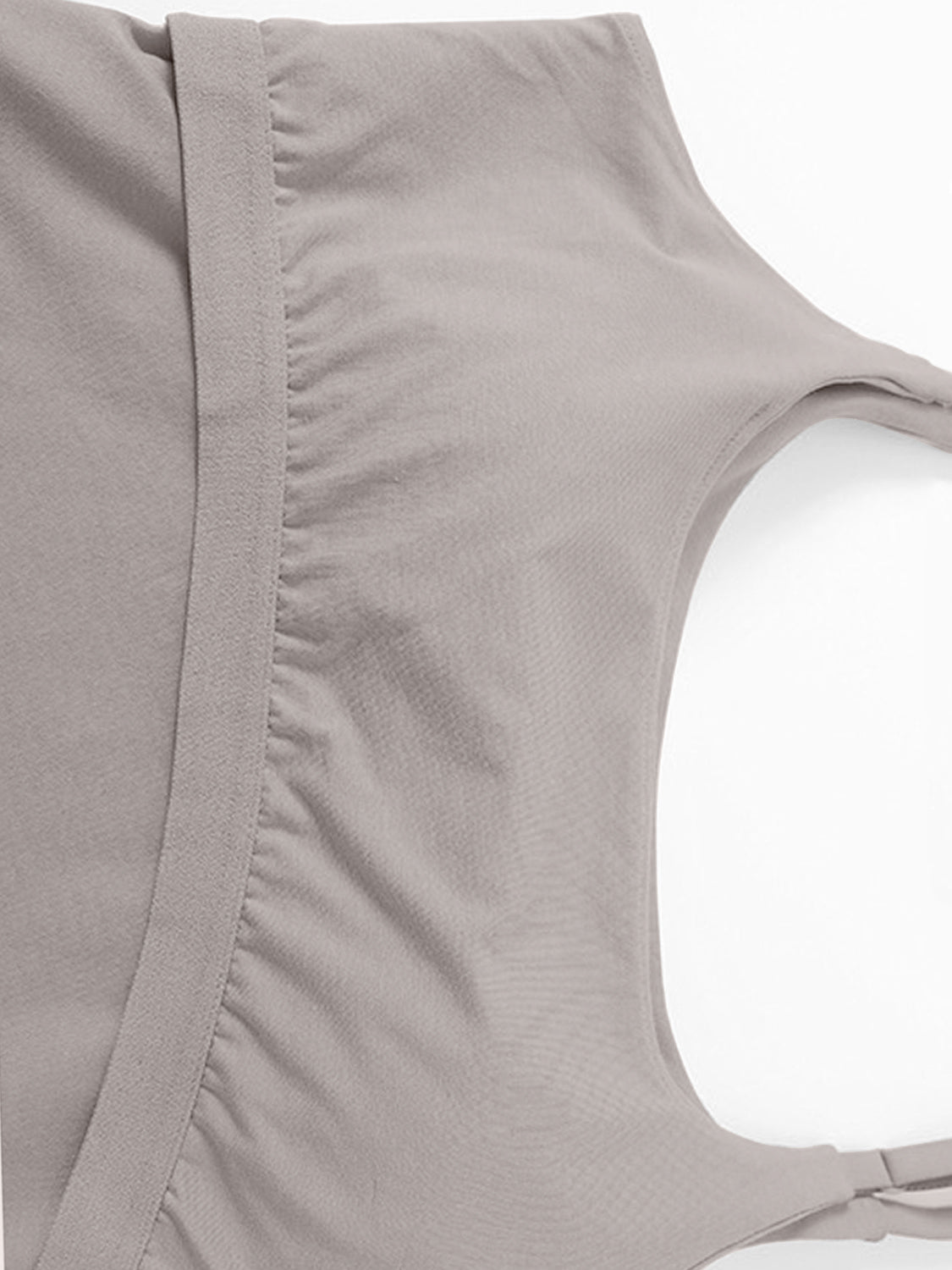 Scoop neck cropped cami with chest pads, opaque and highly stretchy.