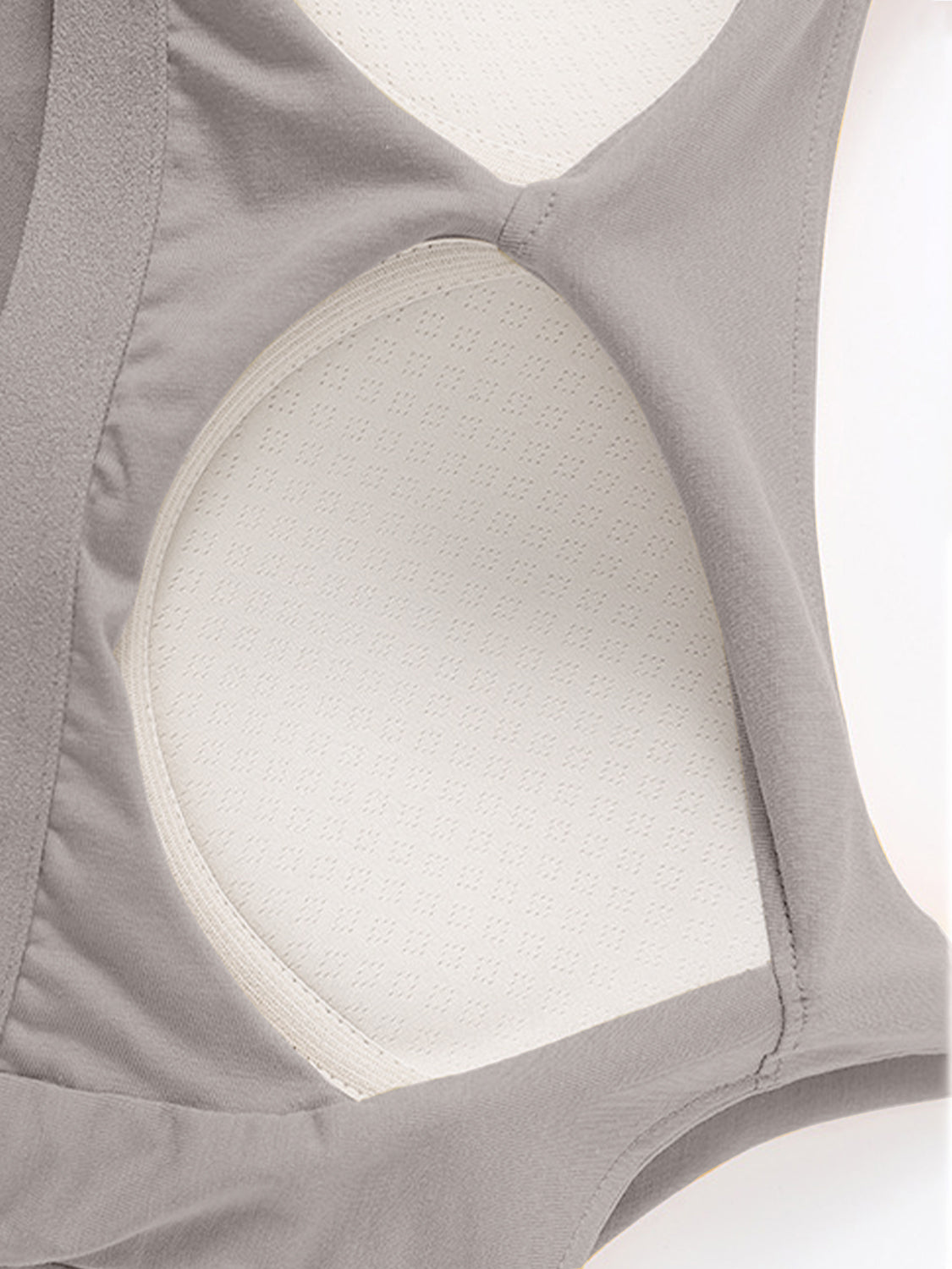 Scoop neck cropped cami with chest pads, opaque and highly stretchy.