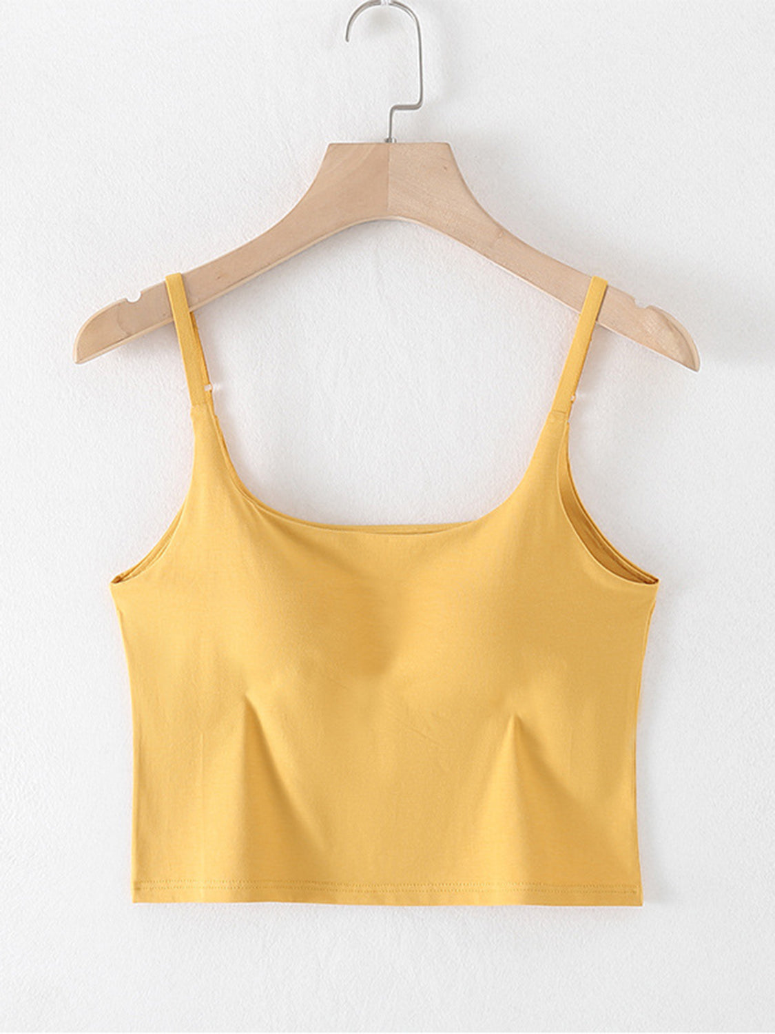 Scoop neck cropped cami with chest pads, opaque and highly stretchy.