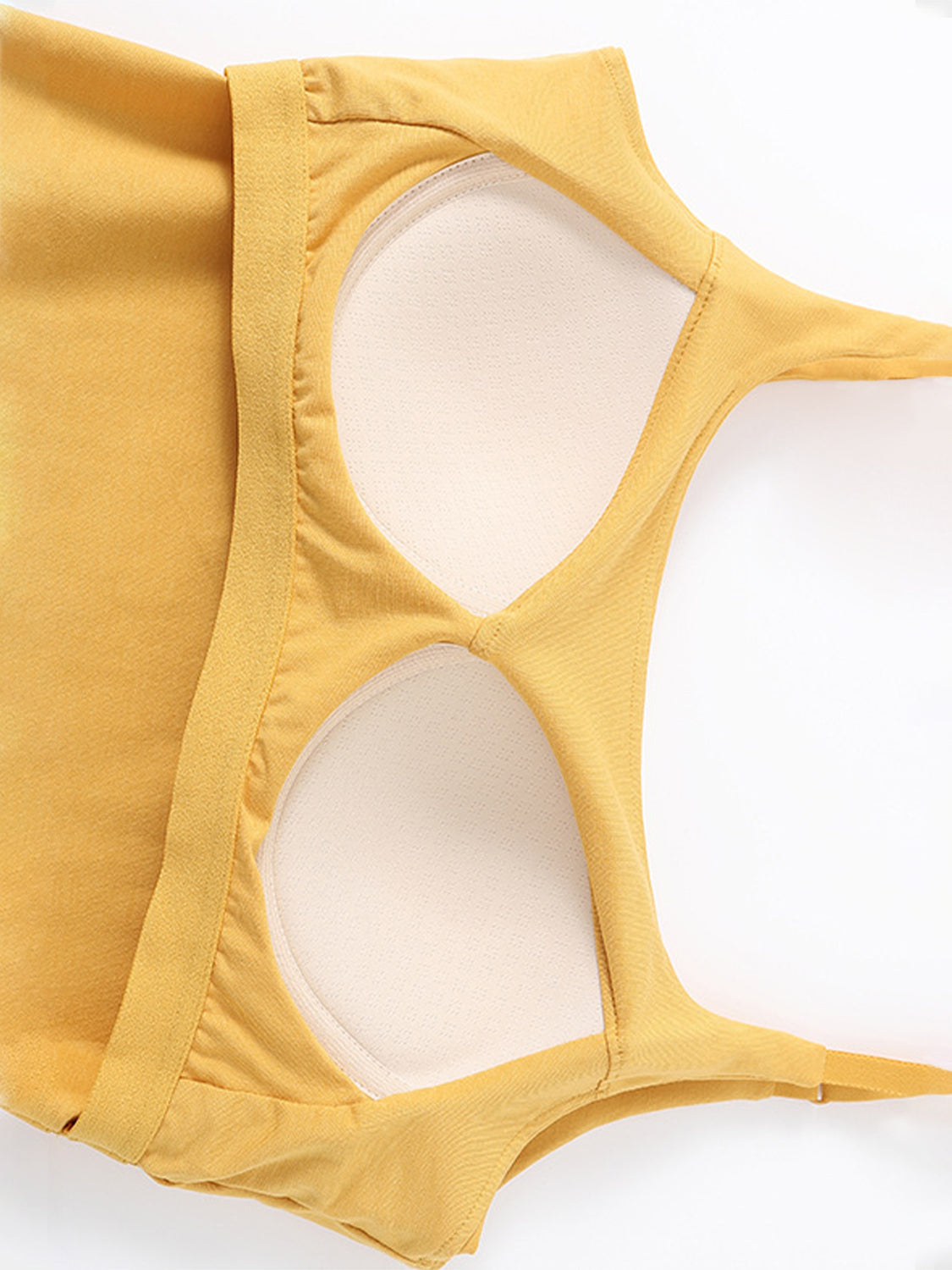 Scoop neck cropped cami with chest pads, opaque and highly stretchy.