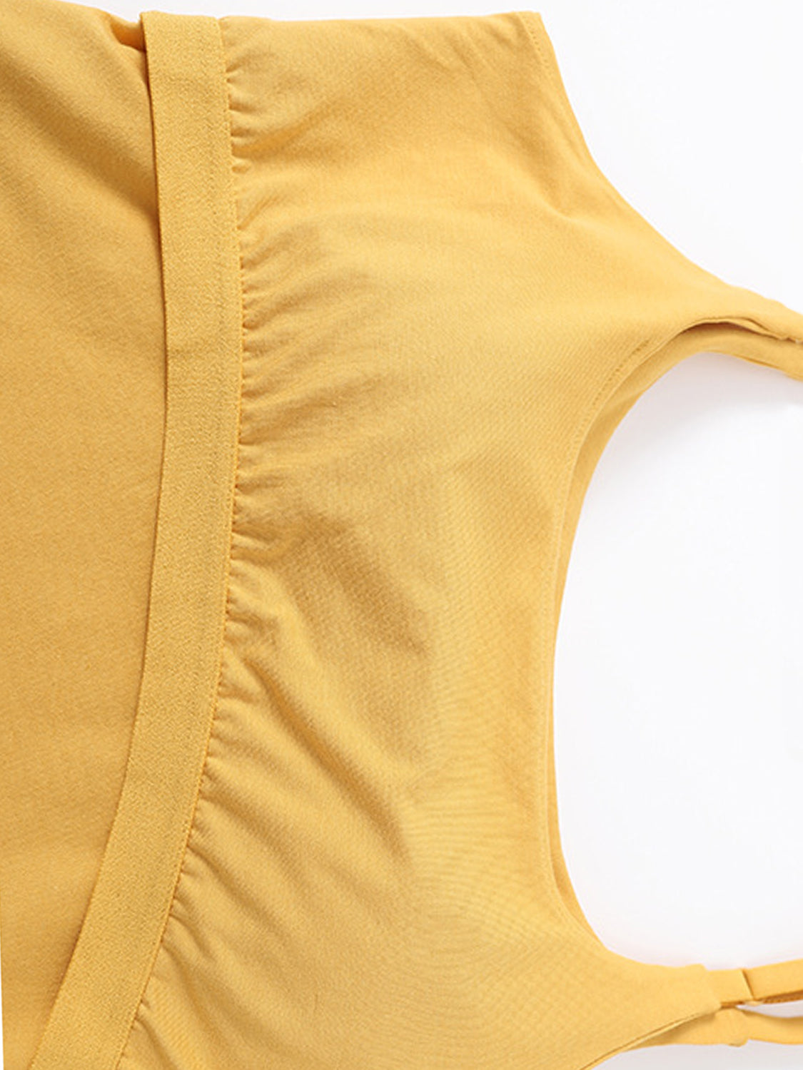 Scoop neck cropped cami with chest pads, opaque and highly stretchy.