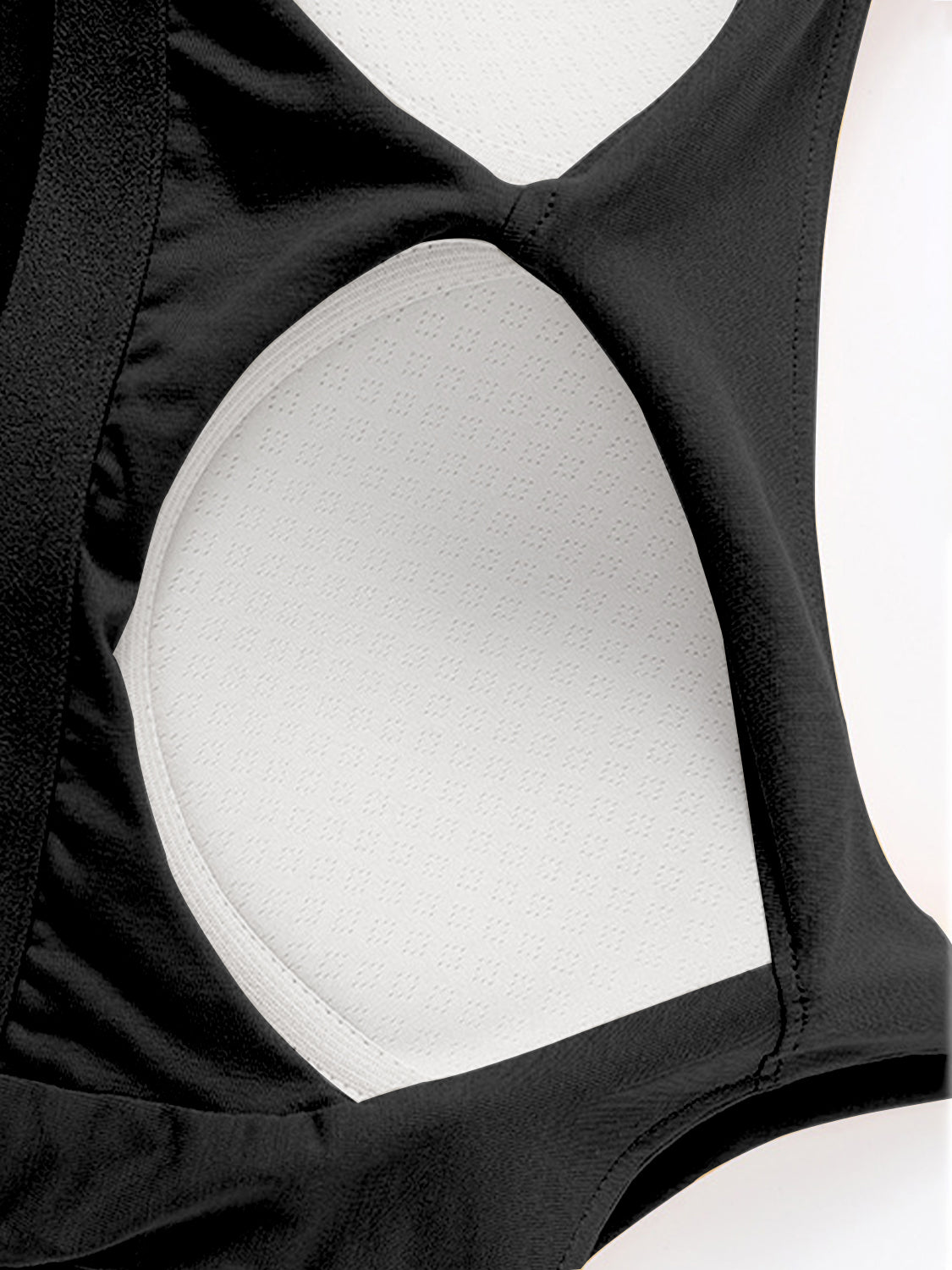 Scoop neck cropped cami with chest pads, opaque and highly stretchy.