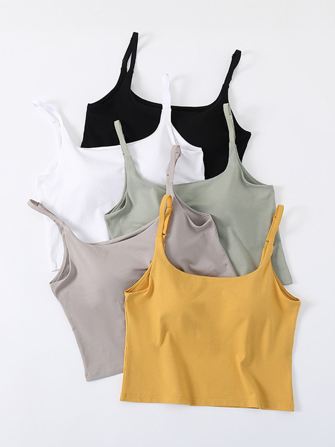Scoop neck cropped cami with chest pads, opaque and highly stretchy.