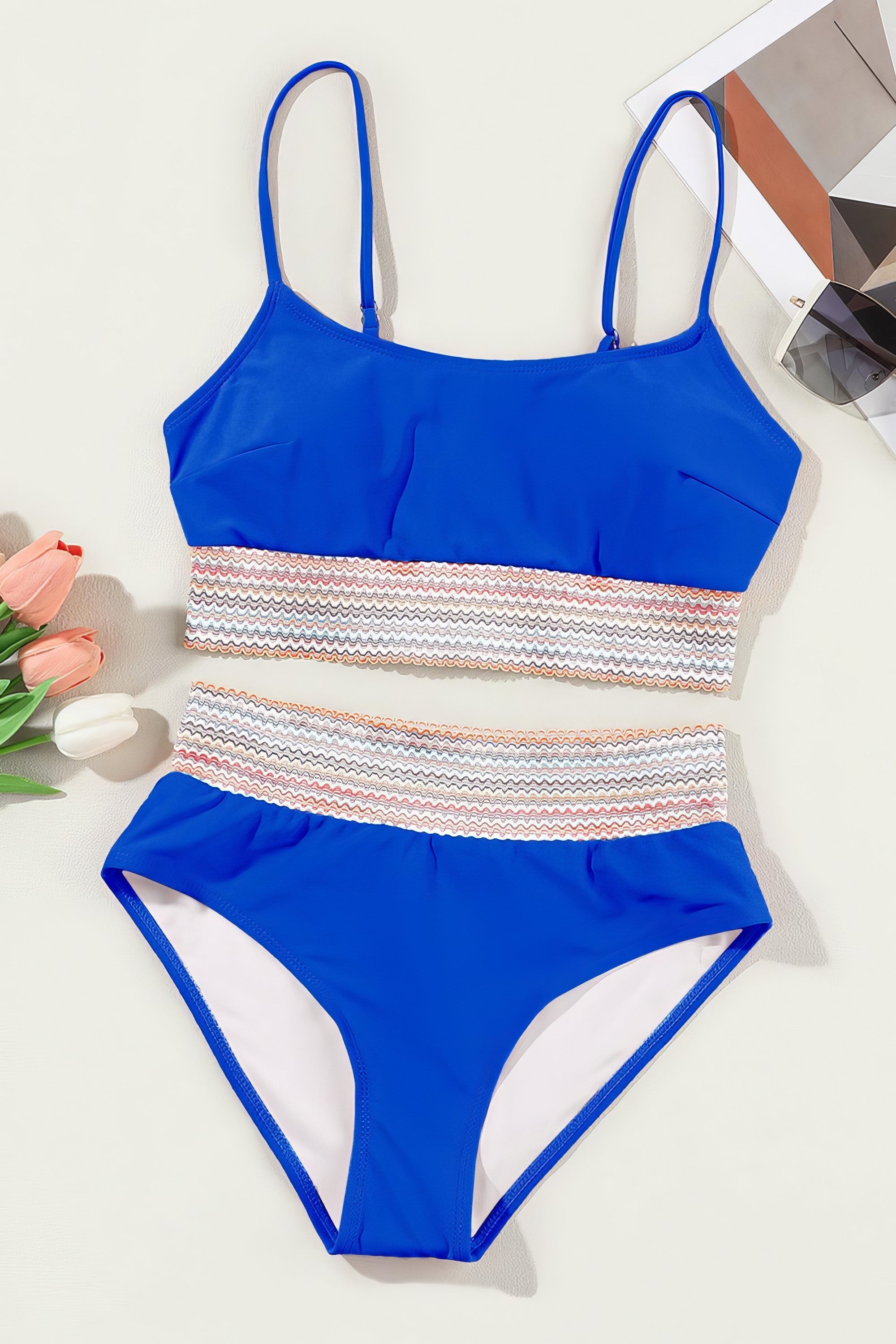 Scoop neck spaghetti strap bikini set with removable padding.