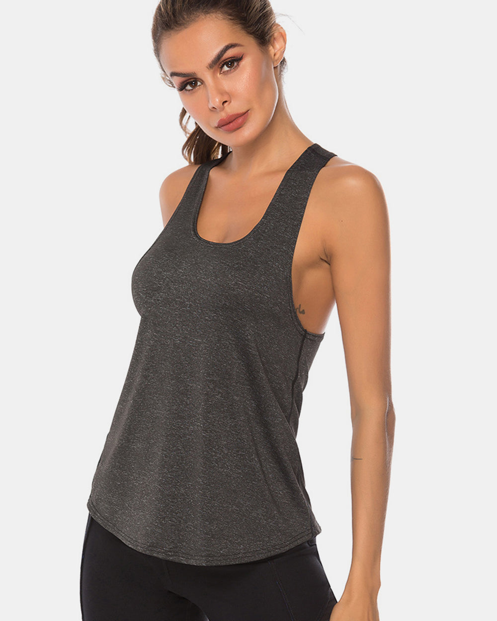 Full size scoop neck wide strap active tank, opaque and moderately stretchy.