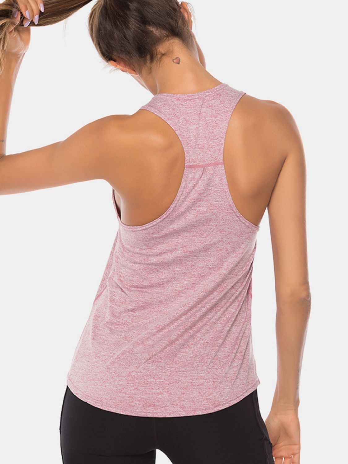 Full size scoop neck wide strap active tank, opaque and moderately stretchy.