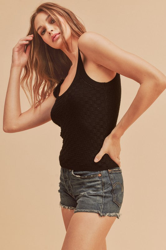 Scoop neck ribbed tank, opaque and slightly stretchy.