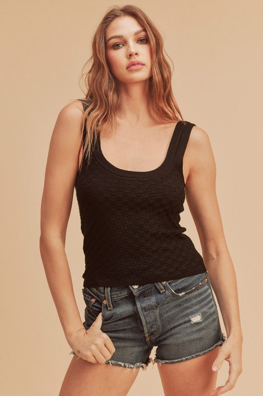 Scoop neck ribbed tank, opaque and slightly stretchy.